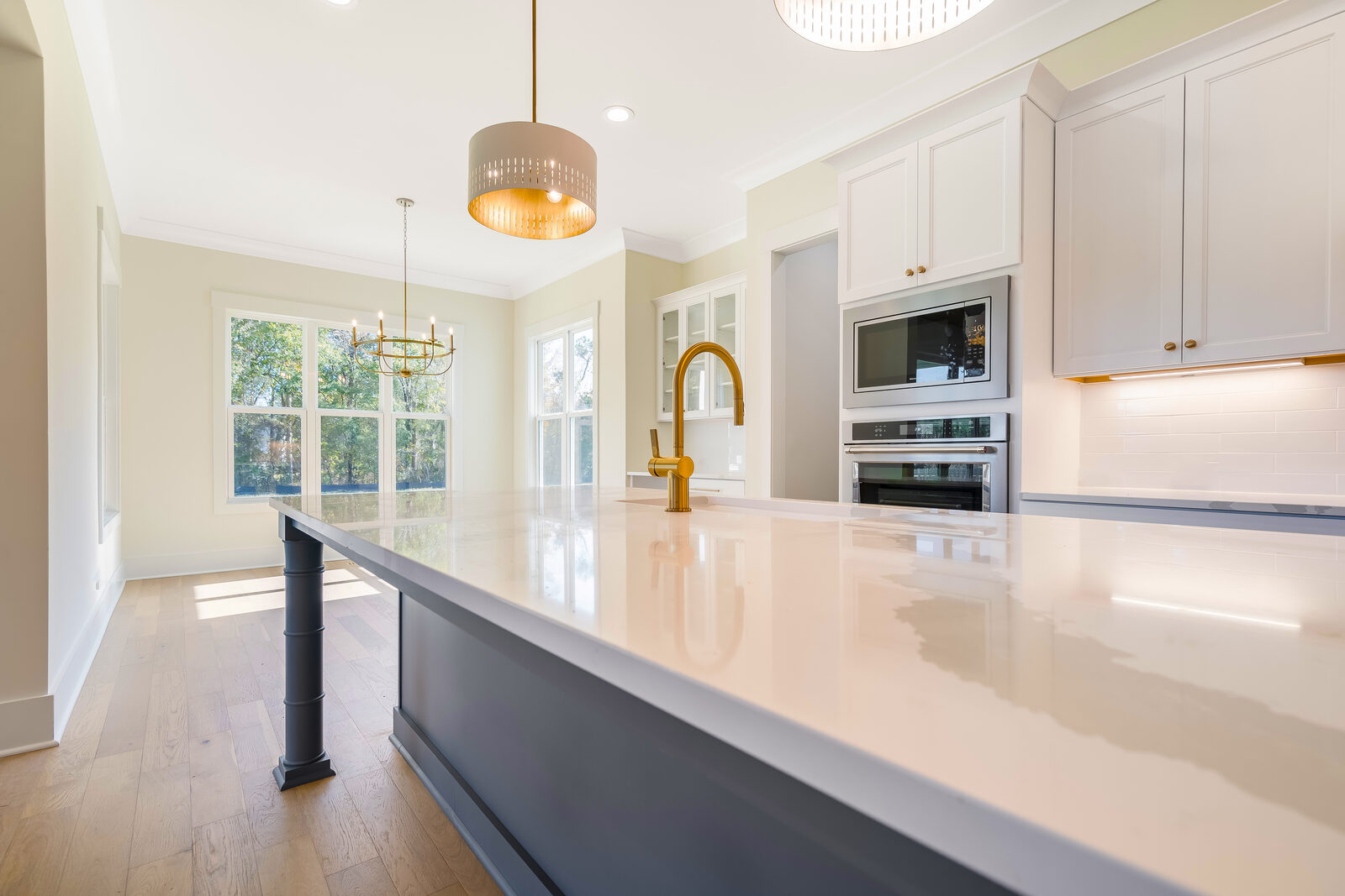 Brass-accented kitchen in a Gemstone custom home