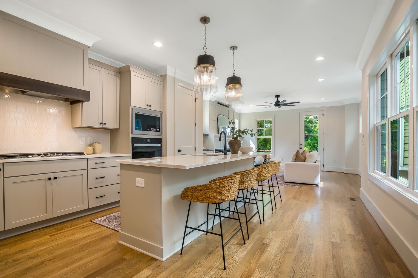 Kitchen with a waterfall island in a Gemstone cottage in Apex, NC